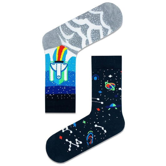 Unisex socks with rockets flying in space, stars and planets on a dark background.