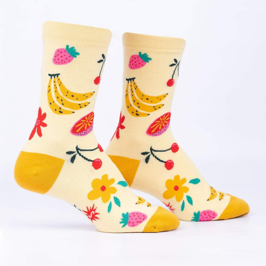 You’re on a warm sun-soaked beach sipping an ice cold glass of fruit punch, with every care in your life miles away. Or you’ll feel that way after sliding these beauties over your toes. Another popular Design A Sock Contest entry has found its way to becoming one of our favorite pairs, and the only thing that could make it better might be a tiny paper umbrella.