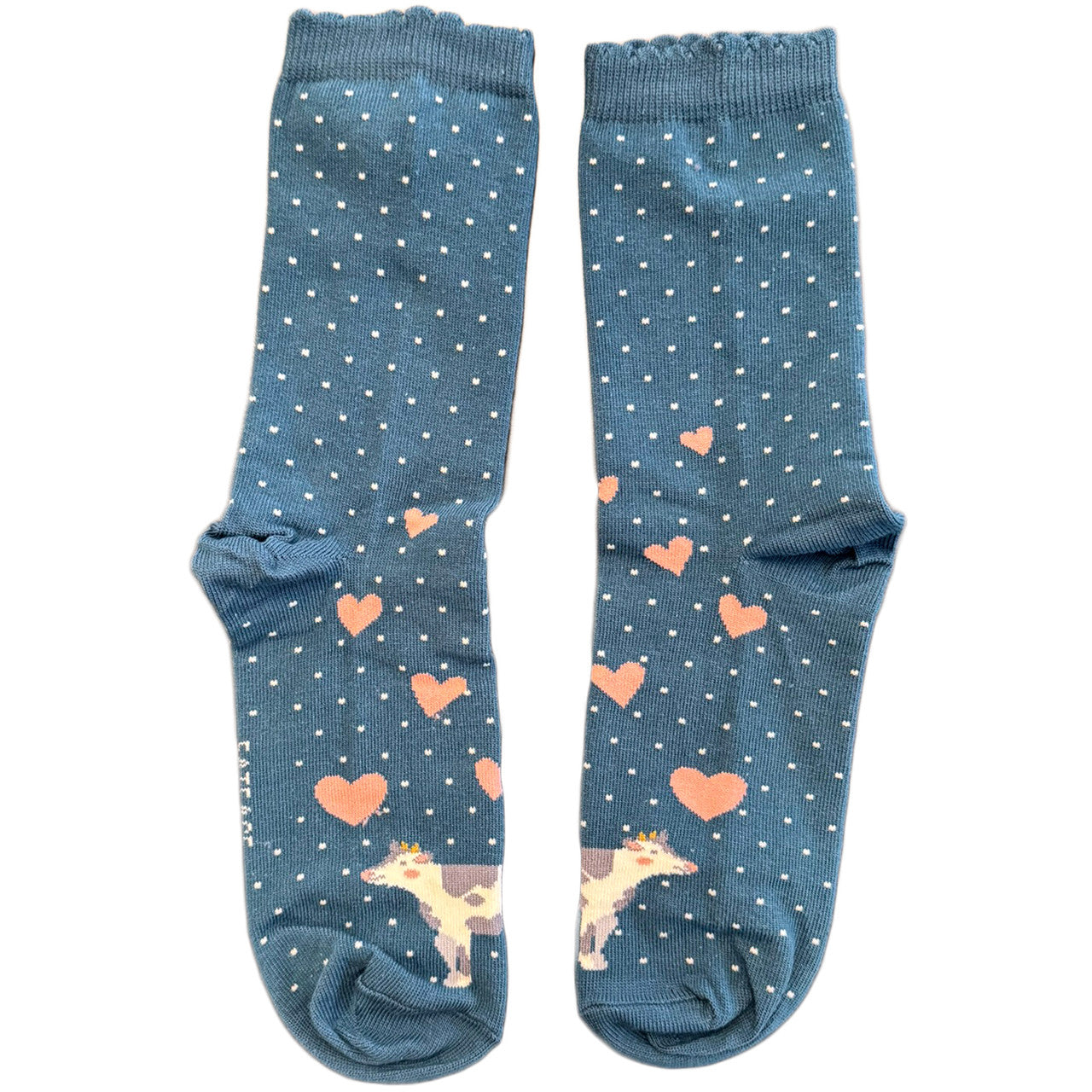 Introducing Cow Socks with Pink Hearts on a Blue Dotted Background – Embrace Playful Chic!
Unleash your inner charm with our Cow Socks featuring adorable pink hearts set against a whimsical blue dotted backdrop. Crafted for both style and comfort, these socks are the perfect addition to any fashion-forward wardrobe. Made from high-quality materials, they ensure durability and a snug fit with every step. Whether you're strutting through the city streets or lounging at home, let these cow socks add a touch o
