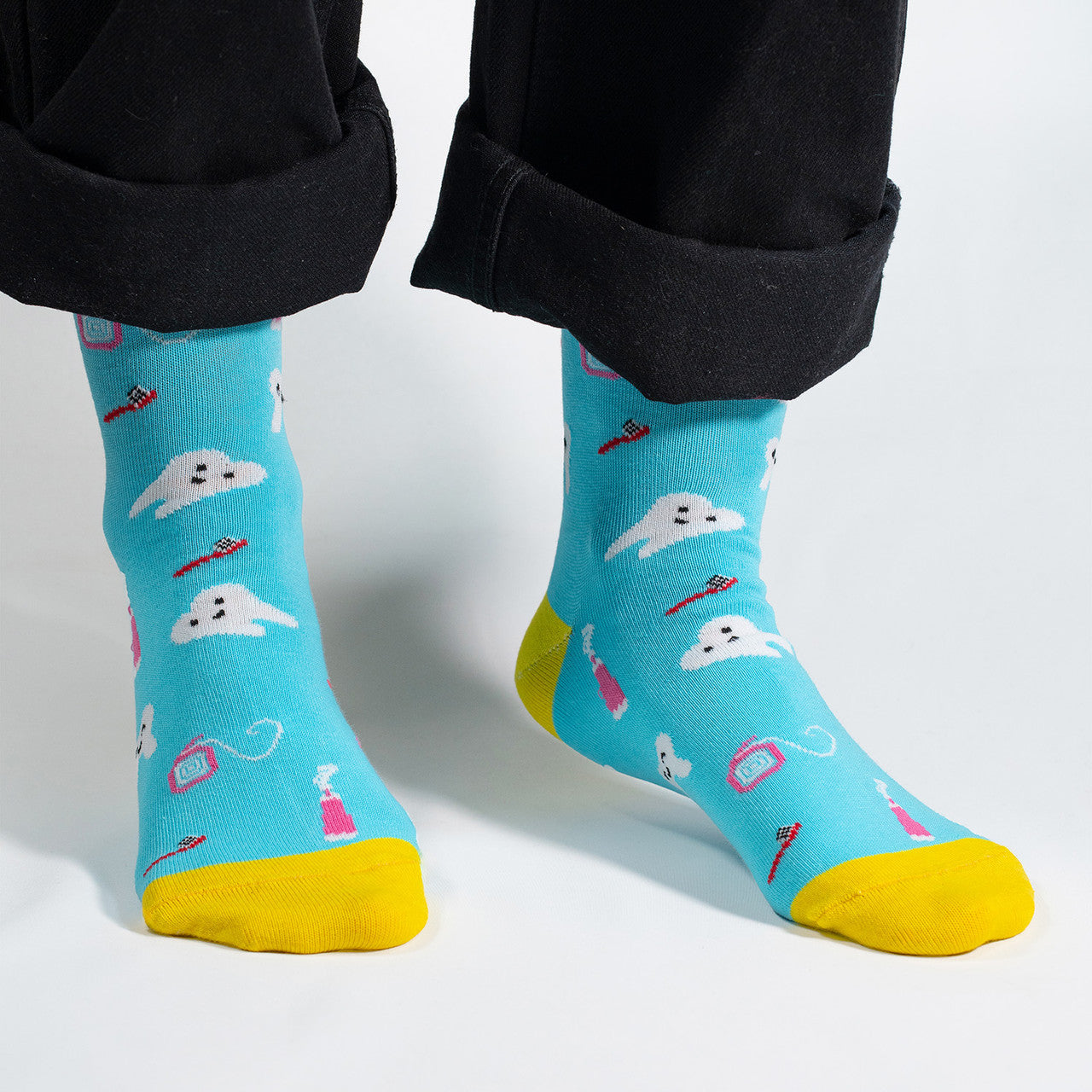 Step into dental style with our Dentist Icons Socks! Featuring a playful pattern of dental symbols like toothbrushes, toothpaste, and smiling teeth, these socks are a whimsical and charming addition to your wardrobe. Crafted for comfort and flair, these socks are perfect for dental professionals or anyone who wants to add a touch of dental charm to their outfit.
Whether you're heading to the dental office or just want to showcase your appreciation for oral health, our Dentist Icons Socks are a fun and uniq