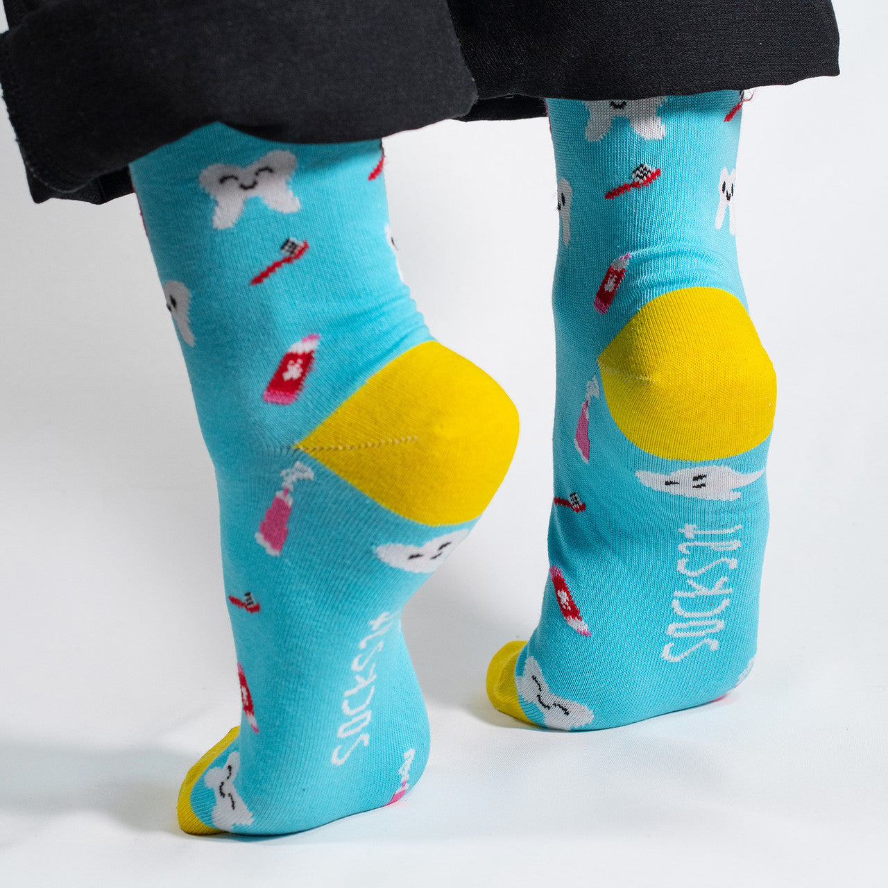 Step into dental style with our Dentist Icons Socks! Featuring a playful pattern of dental symbols like toothbrushes, toothpaste, and smiling teeth, these socks are a whimsical and charming addition to your wardrobe. Crafted for comfort and flair, these socks are perfect for dental professionals or anyone who wants to add a touch of dental charm to their outfit.
Whether you're heading to the dental office or just want to showcase your appreciation for oral health, our Dentist Icons Socks are a fun and uniq