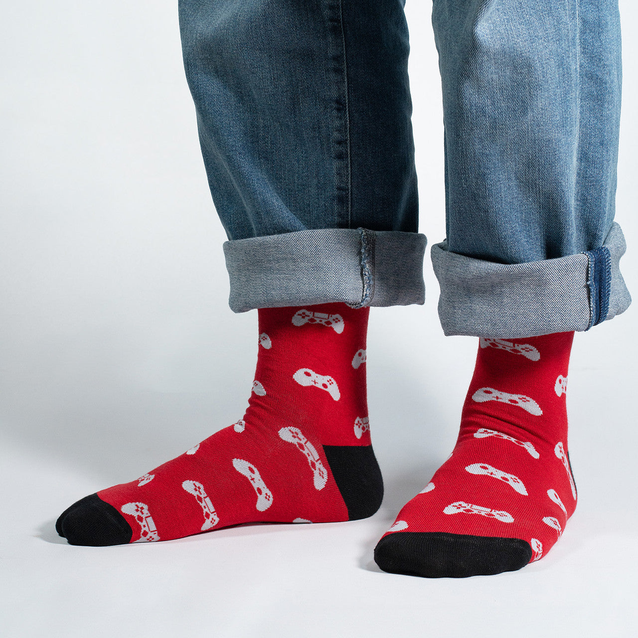 Red socks featuring gaming joysticks, perfect for gamers and gaming enthusiasts.
Whether you're conquering virtual worlds or just want to showcase your gaming spirit, our Joystick Controllers Icons Socks are the perfect accessory. Step into the world of pixels and play – order your pair today and let your socks reflect your passion for the gaming universe!