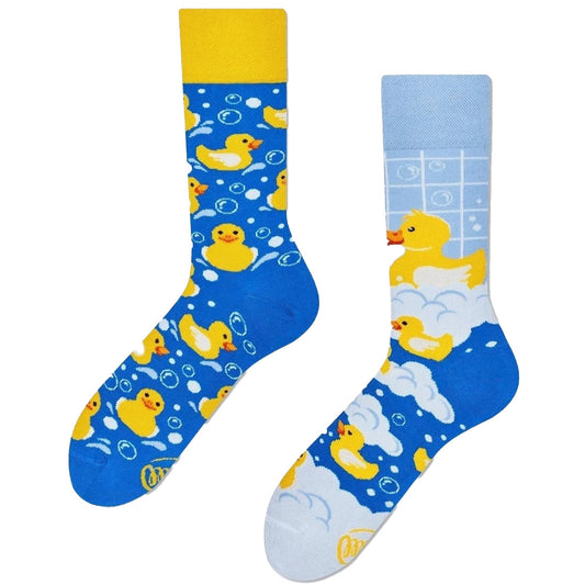 Mismatched socks with squeaky rubber ducks taking a bath, fun and colorful design.