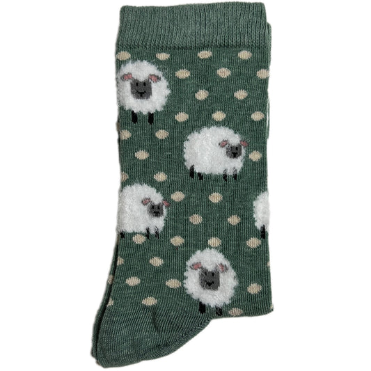 Green socks featuring cute sheep and white dots, soft and stylish.