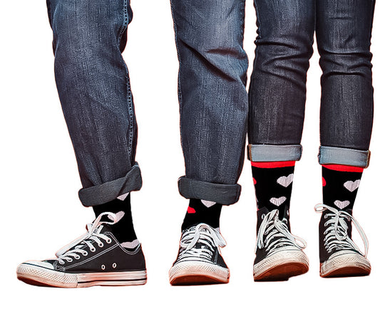 His and Hers gift box with two pairs of black socks featuring white and red hearts, perfect for Valentine’s Day or romantic occasions.