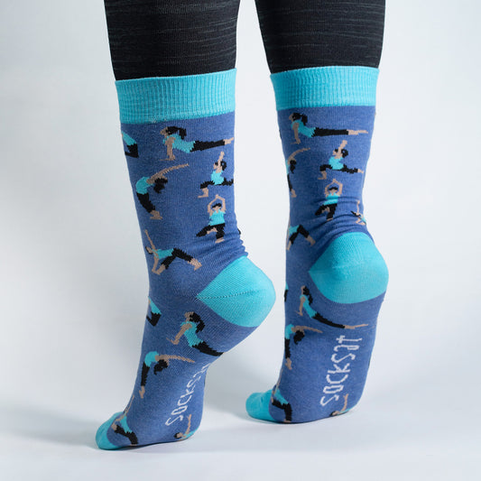 Elevate your zen with our Yoga Poses Socks! Featuring a dynamic pattern of various yoga poses, these socks are designed to bring balance and comfort to your every step. Crafted for both style and flexibility, these socks are perfect for yoga enthusiasts or anyone looking to add a touch of mindfulness to their wardrobe.
Whether you're heading to the studio or simply embracing a more mindful lifestyle, our Yoga Poses Socks are a perfect addition to your sock collection. Step into serenity and style – order y