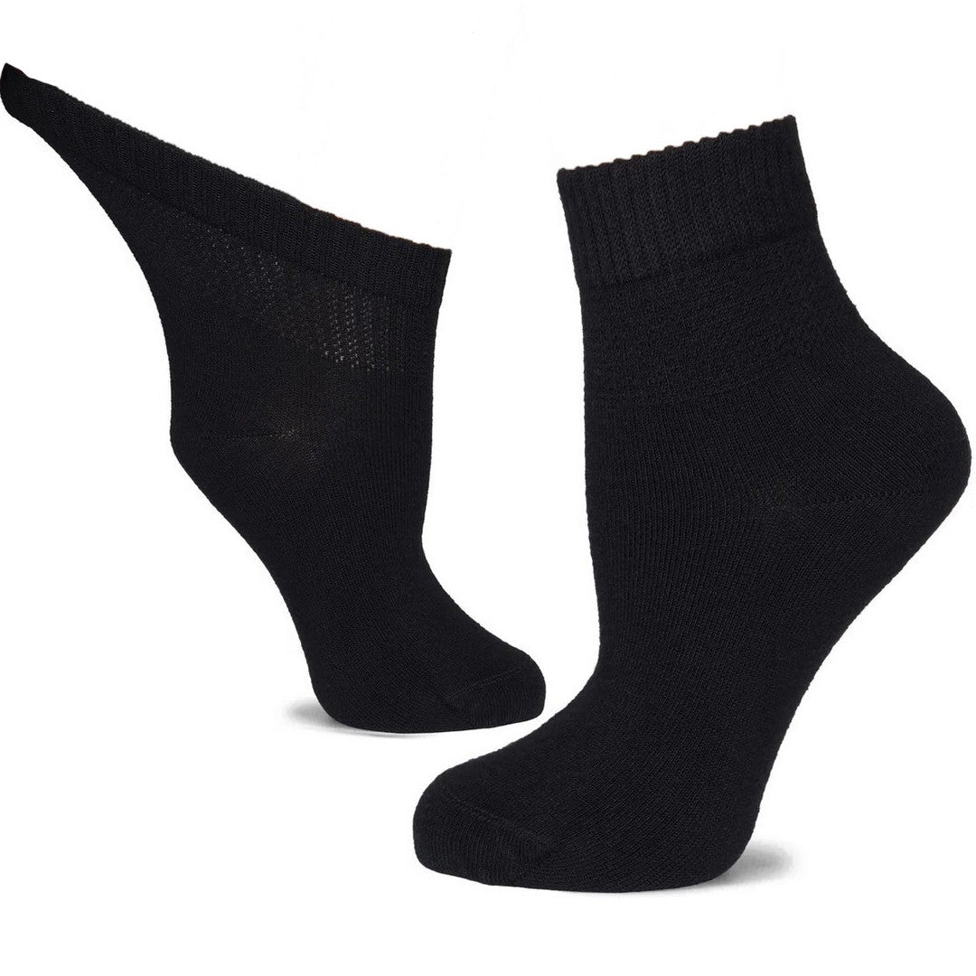 Caring for your feet starts with the right pair of socks, especially when managing diabetes. Our collection of diabetic socks is thoughtfully crafted to prioritize both your health and comfort. Made from luxuriously soft bamboo fabric, these socks are as gentle as a second skin, ideal for those with sensitive feet. The smooth, hand-linked toe seams eliminate any harsh rubbing, while the gentle grip cuffs ensure they stay comfortably in place without constricting. Cushioned soles add an extra layer of suppor
