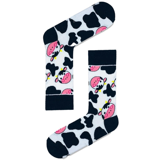 Cow print socks with cow faces, black and white farm-themed design.