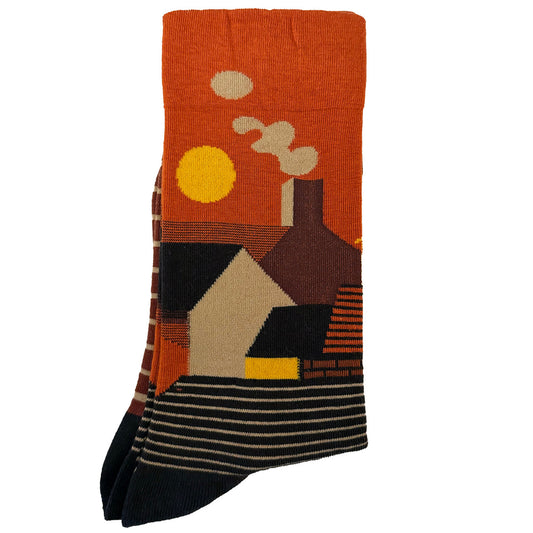 Introducing our cozy Orange House Graphic Socks for a touch of home wherever you go! These socks feature a charming house graphic on a vibrant orange background, adding a pop of color and personality to your outfit. Crafted for comfort and style, they make the perfect unique gift. Step into warmth and order your pair now!