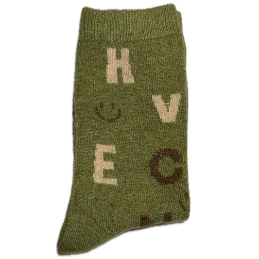 Green Wool & Angora women’s socks with random letters design, warm, cozy, and stylish for winter.