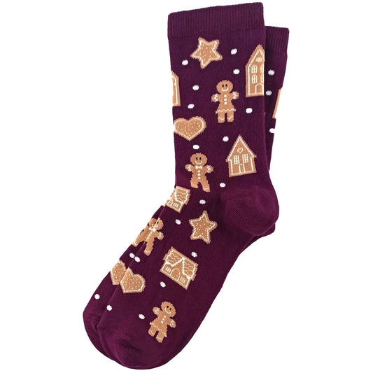 Purple women’s socks featuring a gingerbread family design with festive holiday accents.