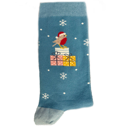 Women’s socks featuring a Santa bird holding a gift, festive and colorful holiday design.