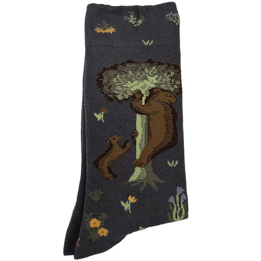 Step into comfort and style with our Green Sloth Graphic Socks for Women. These vibrant green socks feature an adorable sloth hanging from a tree, adding a playful touch to your outfit. Crafted for superior comfort, these socks are perfect for sloth enthusiasts and make a unique, charming gift. Embrace the whimsy – order your pair today!