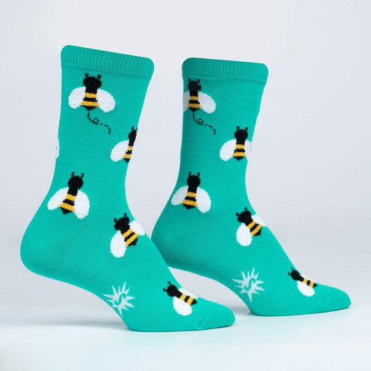 Oh, bees. How can we ever show our appreciation for all that they do for our planet? We hope they'd accept our humble offering of these socks, upon which we wove super fuzzy and adorable bees. It's kind of like you're the flower when you wear them, and that's fitting because you're beautiful and make us smile. No wonder these bees love you!