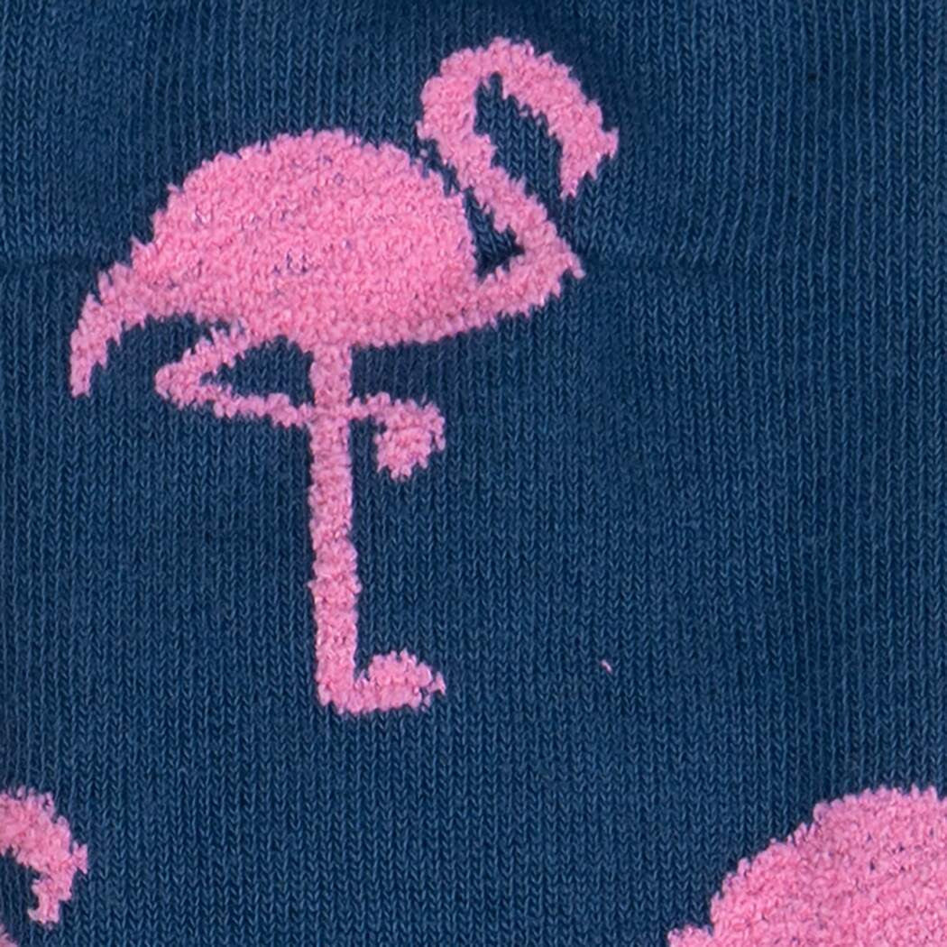 Did you know flamingos aren't born pink? They're born with whitish feathers, and turn pink from the algae and crustaceans they eat. It's hard to say definitively why they stand on one foot, but that pose and their famous coloring make them instantly recognizable creatures. We had to illustrate them for ourselves, and make a sock that'll flamin-go with you anywhere you like.