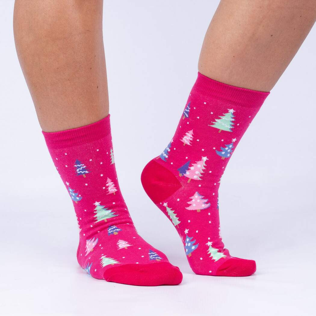 One of our favorite things about the holidays is the incandescent glow of the lights strung about the tree in our living rooms after a long day of decorating. The glow is a little different now days with LED’s, but you get the picture right? We've harnessed that with these awesome glow in the dark holiday socks that probably match some of the wrapping paper you bought on sale last December 26th. You’ll be lookin’ sharp and feelin’...pine rocking around the tree this year!