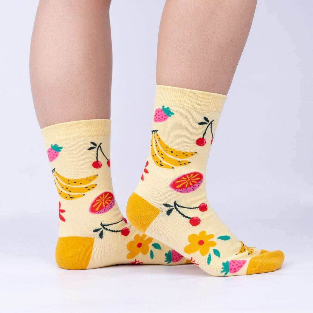 You’re on a warm sun-soaked beach sipping an ice cold glass of fruit punch, with every care in your life miles away. Or you’ll feel that way after sliding these beauties over your toes. Another popular Design A Sock Contest entry has found its way to becoming one of our favorite pairs, and the only thing that could make it better might be a tiny paper umbrella.