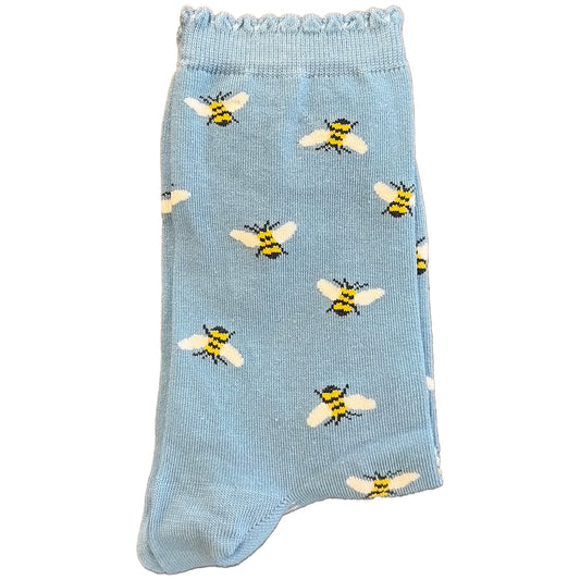 Introducing Blue Bees Socks for Women – Elevate Your Style with a Buzz of Charm!

Step into a world of whimsy with our Blue Bees Socks, designed exclusively for women seeking a blend of style and comfort. Against a captivating blue background, charming bees dance playfully across these socks, adding a touch of delight to any ensemble. Crafted from high-quality materials, our women's socks ensure durability and all-day comfort. Whether you're lounging at home or stepping out for a casual outing, these socks 