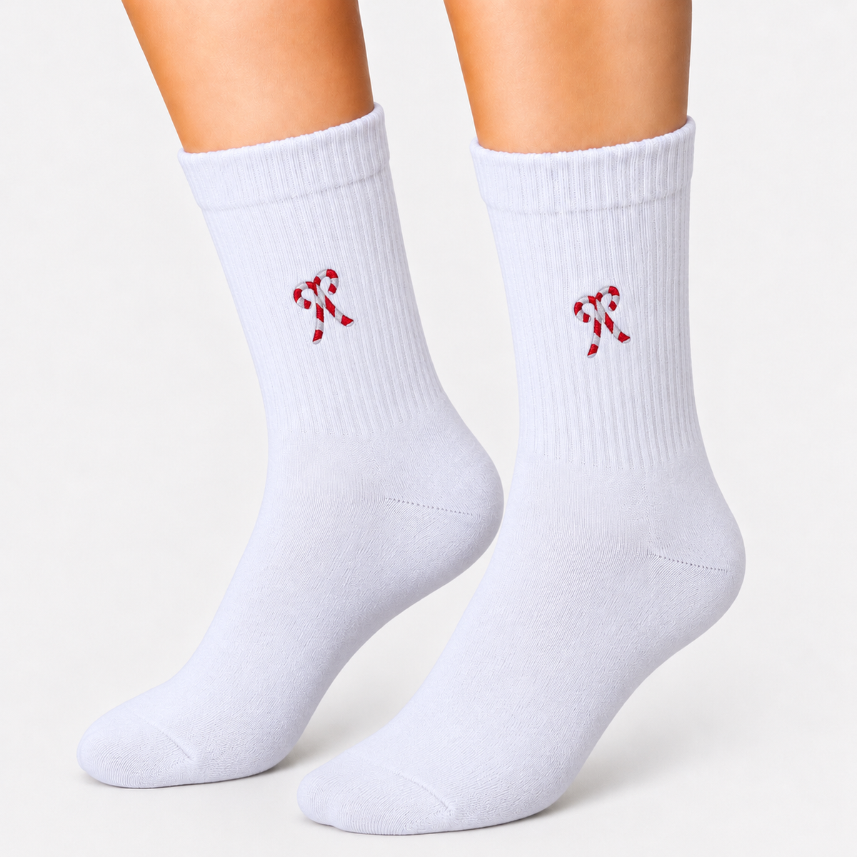 White crew socks with embroidered candy canes