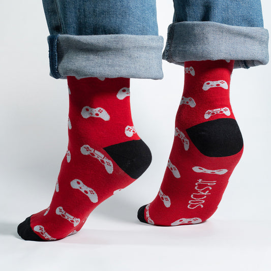 Red socks featuring gaming joysticks, perfect for gamers and gaming enthusiasts.


Whether you're conquering virtual worlds or just want to showcase your gaming spirit, our Joystick Controllers Icons Socks are the perfect accessory. Step into the world of pixels and play – order your pair today and let your socks reflect your passion for the gaming universe!