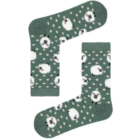 Green socks featuring cute sheep and white dots, soft and stylish.