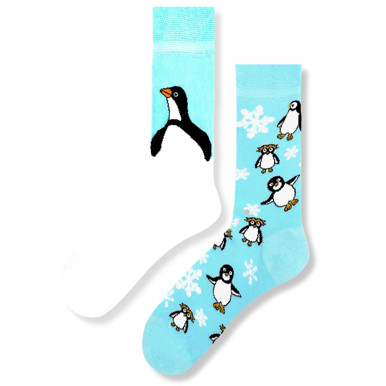Mismatched blue socks with penguins, polar bears, and arctic animals – cozy unisex winter socks.