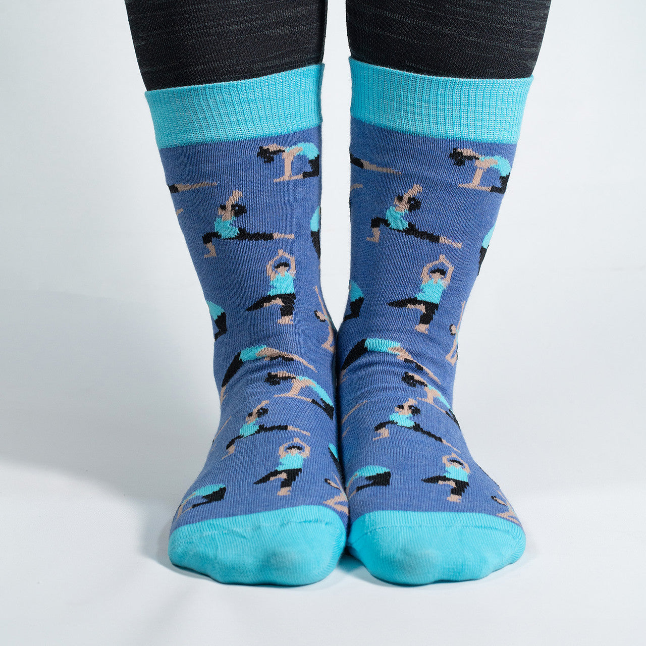 Elevate your zen with our Yoga Poses Socks! Featuring a dynamic pattern of various yoga poses, these socks are designed to bring balance and comfort to your every step. Crafted for both style and flexibility, these socks are perfect for yoga enthusiasts or anyone looking to add a touch of mindfulness to their wardrobe.

Whether you're heading to the studio or simply embracing a more mindful lifestyle, our Yoga Poses Socks are a perfect addition to your sock collection. Step into serenity and style – order y